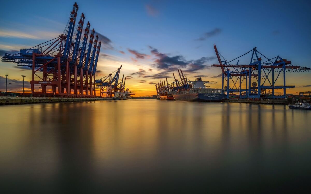 hamburg-port-cranes-sunset-cargo-ships